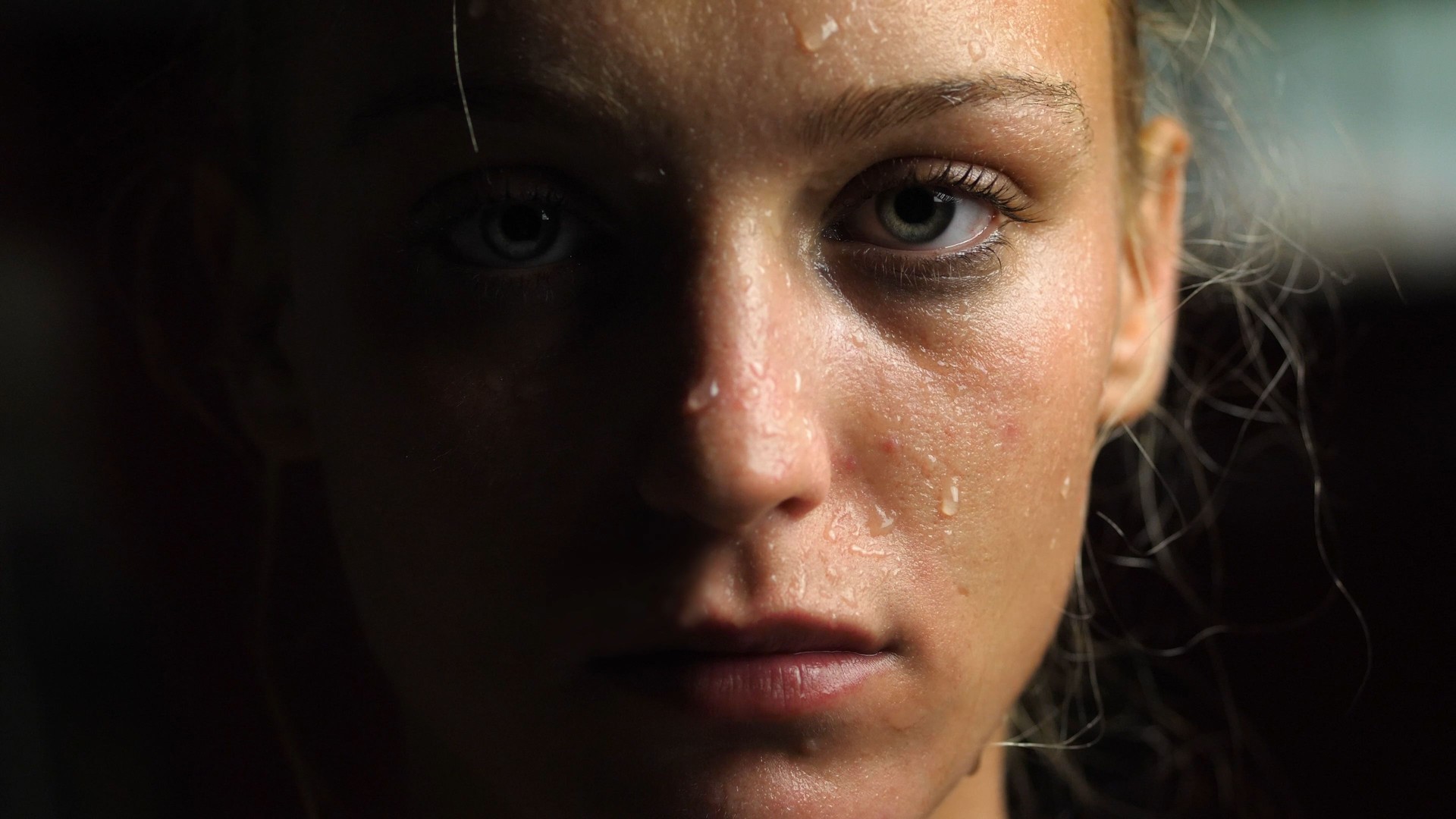 Sweaty Woman Looking at the Camera, Close-up